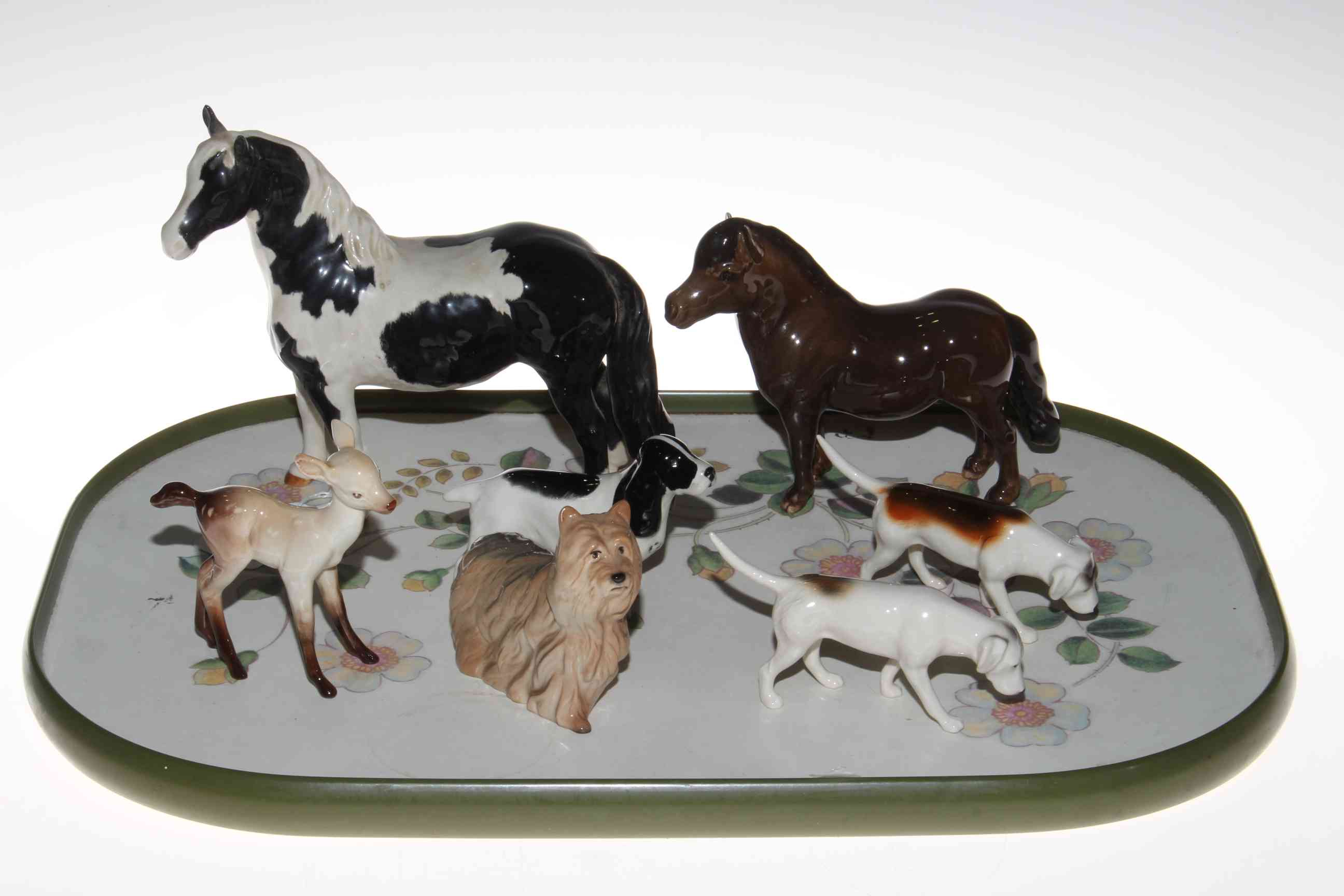 Beswick Pinto horse, Beswick pony, fawn and four dogs.