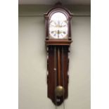 Dutch triple weight wall clock with arched moon phase dial.