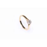 18 carat gold solitaire diamond ring.