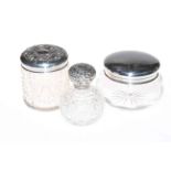 Two silver topped toilet jars and scent bottle (3).