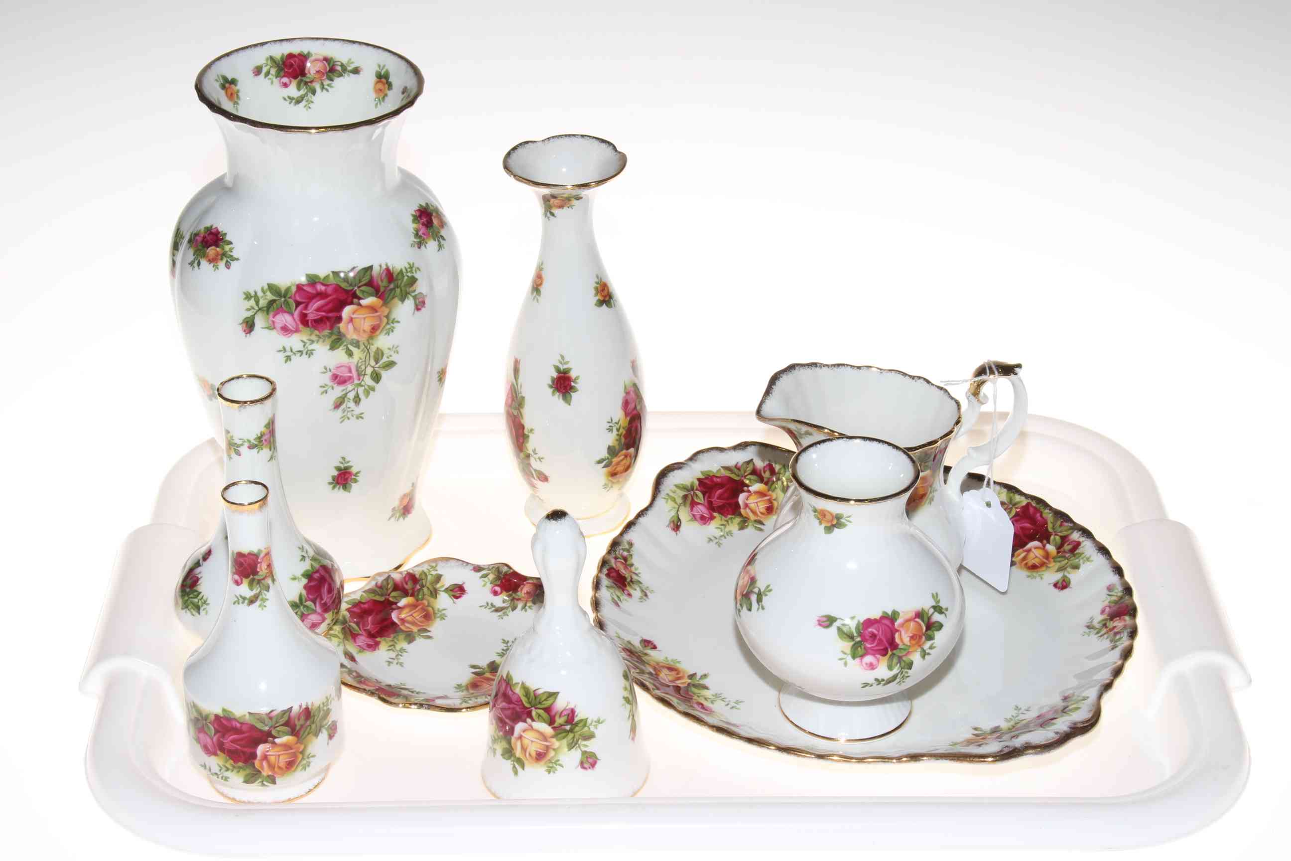 Royal Albert Old Country Roses vases, plates, bell and jug and two paragon art deco trios.