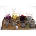 Collection of coloured and clear etched and engraved glass goblets, glasses, etc.