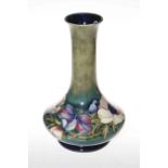 Moorcroft Anemone decorated vase on green ground, 32cm.
