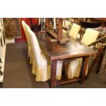 Rustic style rectangular oak two drawer dining table and six chairs.