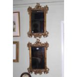 Pair rectangular gilt framed bevelled wall mirrors, 63cm by 38cm (including frame).