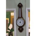 Oak banjo barometer with enamelled dial.