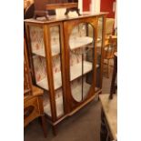 Edwardian mahogany and painted single door vitrine.