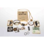 Tin of three gold rings, wristwatch, For Exemplary Service medal, pocket watches, banknotes, etc.