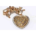 Three colour gold and diamond set heart shaped pendant and chain, stamped to fastener.