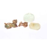 Collection of four pieces of Chinese jade, cat, dog, axe head and bottle.