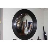 Large black framed convex wall mirror, 90cm diameter (including frame).