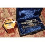 Cased cornet and boxed concertina.