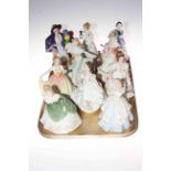 Ten Royal Doulton lady figures.