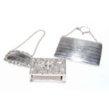 Silver purse, embossed silver matchbox holder, and Irish silver Brandy label (3).