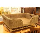 Rattan dog bed.