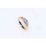 Diamond and gem set 18 carat gold ring.