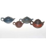 Collection of four Chinese Yixing pottery teapots.