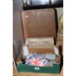 Box of coins and collectables, Pease marked brick, oak book rest, medal, cigarette cards, etc.