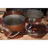 Collection of 19th Century copper pans.