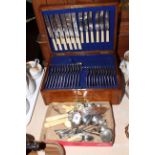 Oak cased part canteen of cutlery and box of assorted cutlery.