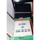 Four albums with mint stamp collections including The Millennium WWII History,