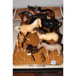 Five Beswick horses, foal, pony, donkey and three small pottery horses.