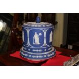 Late 19th Century blue Jasperware stilton cover and stand,