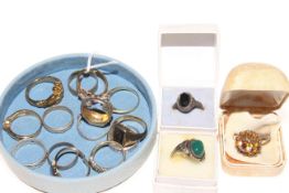 Collection of sixteen dress rings.
