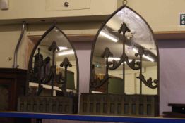 Two metal arched mirrors-troughs.