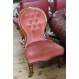 Victorian mahogany framed spoon back nursing chair in buttoned rose draylon.