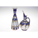 Losol Keeling and Co. Ltd vase and jug, 24cm and 26cm.