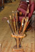 Arboreal stick stand and walking sticks.