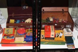 Diecast model cars, board games, postcards, snapshot booklets.