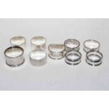 Collection of seven assorted silver napkin rings.