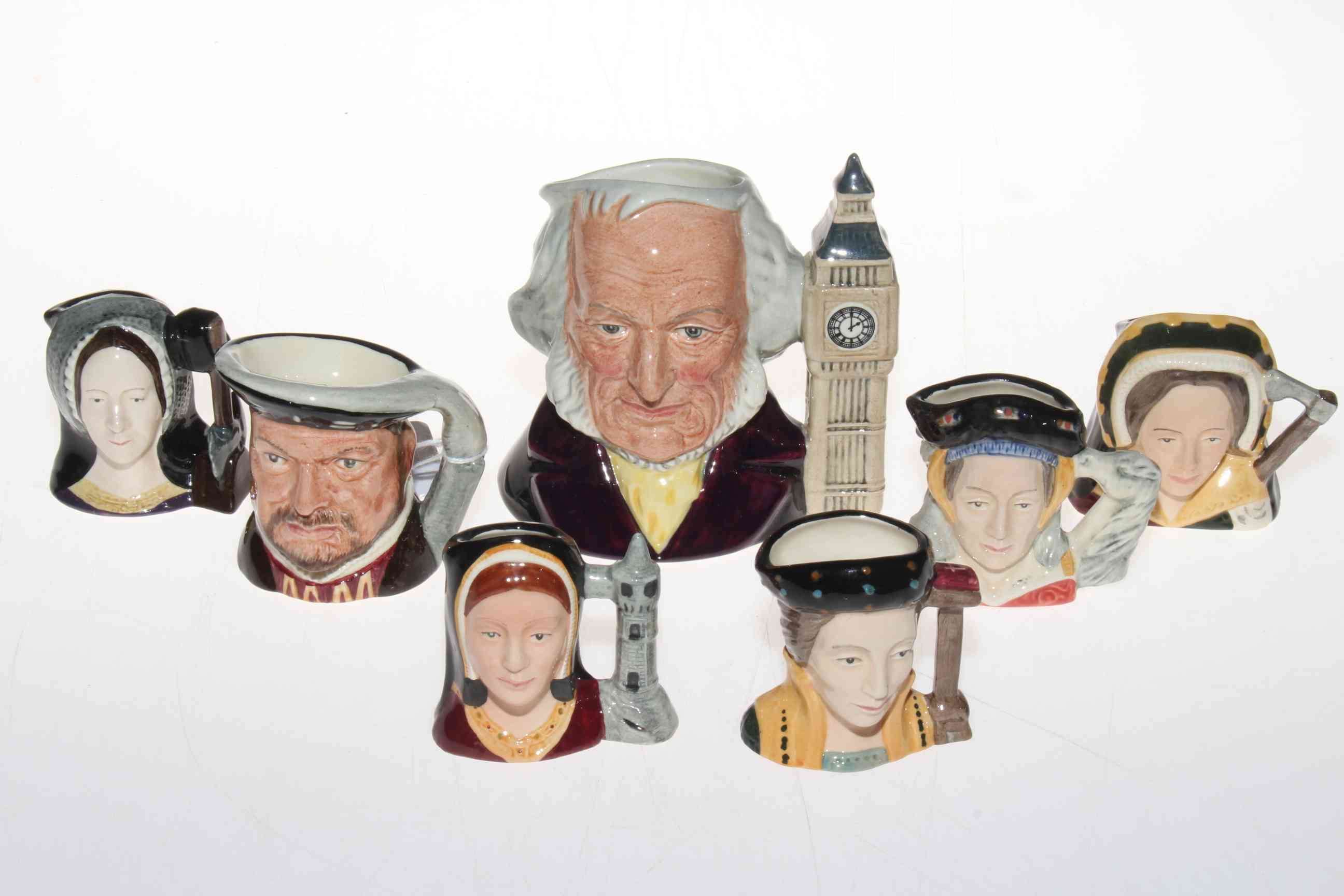 Seven Royal Doulton character jugs including John Doulton, Henry VIII, Anne Boleyn, Anne of Cleves.