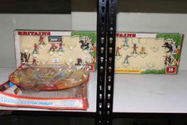 Three boxed toys including Tom and Jerry on Target and hand painted Britain's models.