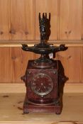 Victorian rouge marble mantel clock, mounted with bronze Aladdin's lamp and cherub, overall 50cm.