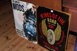 Two signs: Calling All Mods and Wings of the Road.