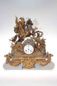 Victorian ornate gilt metal mantel clock having equestrian hunter with hounds and wild boar,