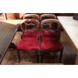Set of four Victorian mahogany shaped balloon back dining chairs.