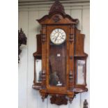 Vienna wall clock in walnut with side mirrors and open quarter shelves, double weight movement,