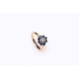 18 carat gold, sapphire and diamond cluster ring, size I.