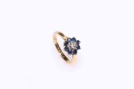 18 carat gold, sapphire and diamond cluster ring, size I.