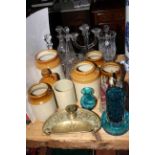Stoneware jars and bottle, decanters, ornate brass inkwell, cruet set, Mdina glass,