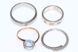 9 carat gold dress ring, silver ring and two diamond set rings (4) sizes P, M, W and U .