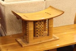 Carved African hardwood stool 41.5cm x 60cm.