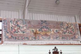 Floral pattern Chinese carpet with a fawn ground, 3.70 by 2.75.