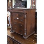 Stained miniature scotch chest of six drawers with turned pillars, 59.5cm by 50cm.