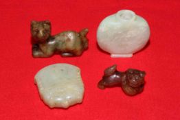 Collection of small Chinese jade items.