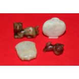 Collection of small Chinese jade items.